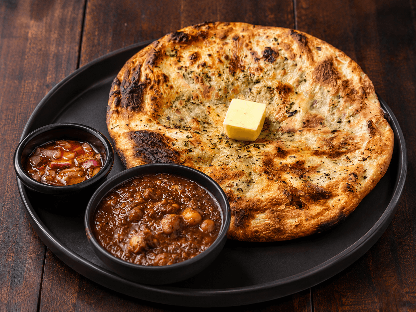 Ambarsariya Aloo Chole Kulcha with paneer, chole, kulcha and sides